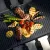 Bild: WMF Raclette Grill Lono Selection | 8 Personen | 1500W | Edelstahl | Keramik Grillplatte | Silber-Schwarz